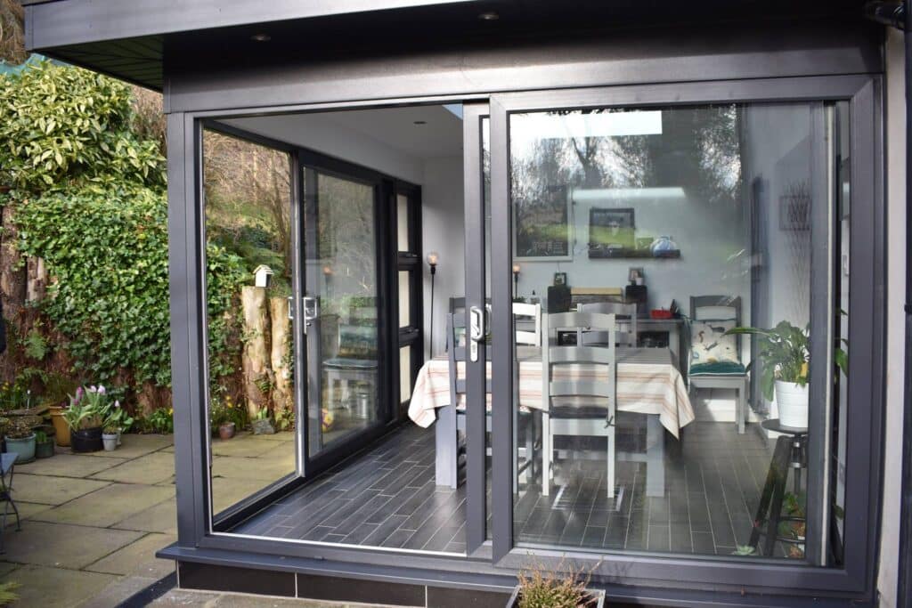 Pod sunroom built with maintenance free materials and large roof lantern by Budget Designer HomeWorks in Northern Ireland