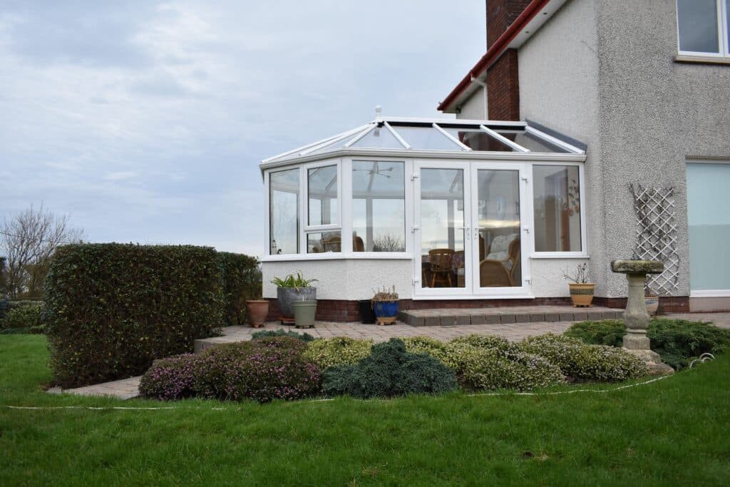 White Conservatory With Dwarf Wall designed and built in Donaghadee by Budget Designer HomeWorks