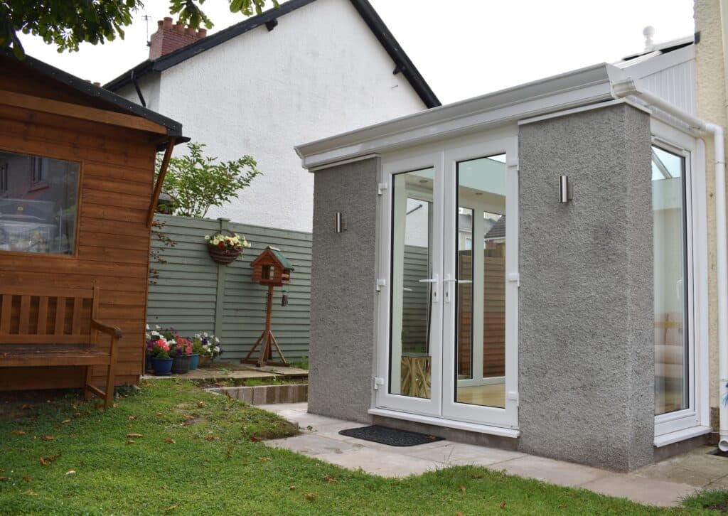A new orangery home extension with decorative cornice built in Belfast by Budget Designer HomeWorks