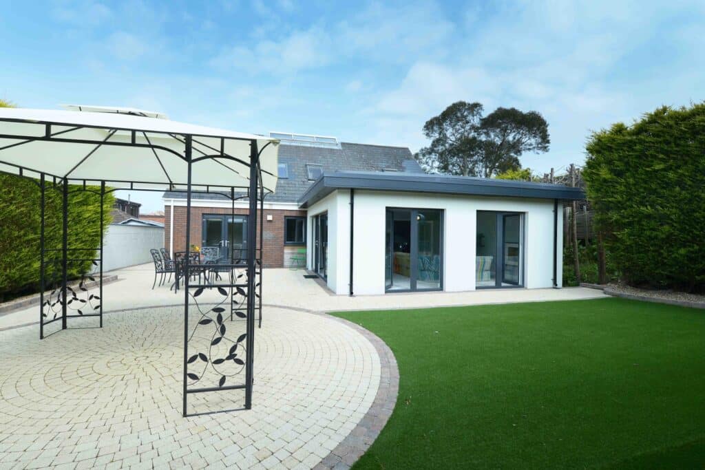Flat roof sunroom with roof lanterns creating a stylish new living area in Belfast