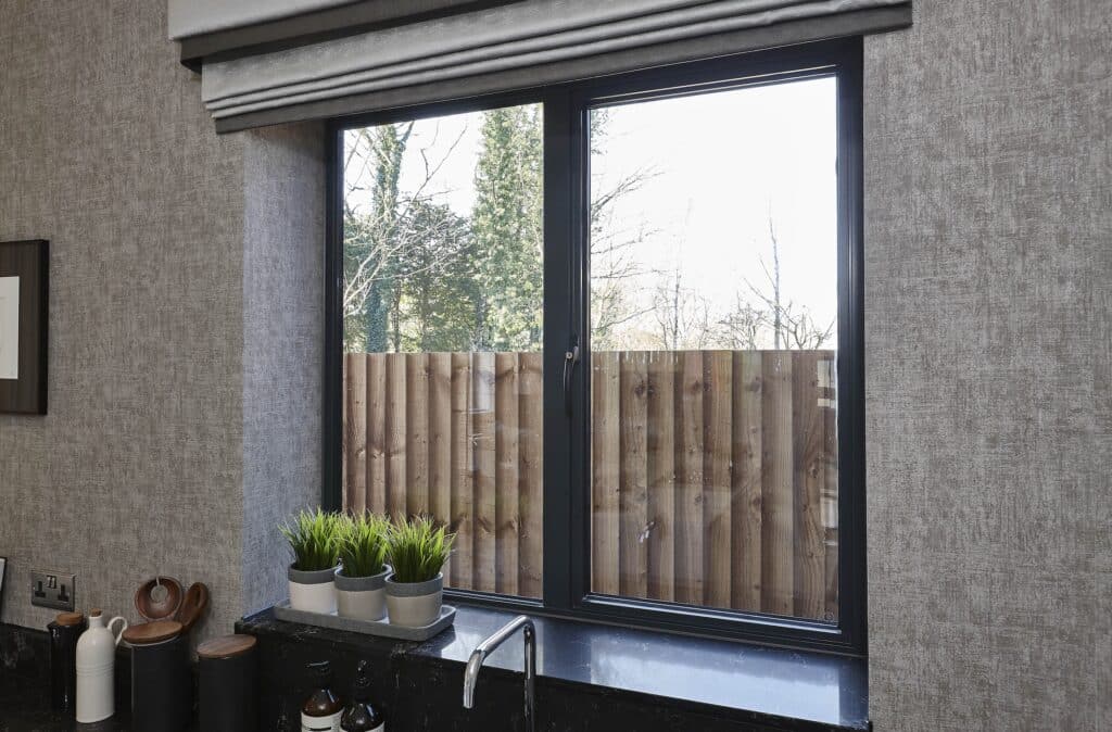 Modern anthracite grey aluminium window with matching handle