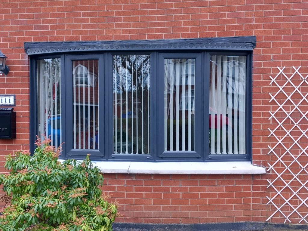 Anthracite grey bow window by Budget Designer HomeWorks