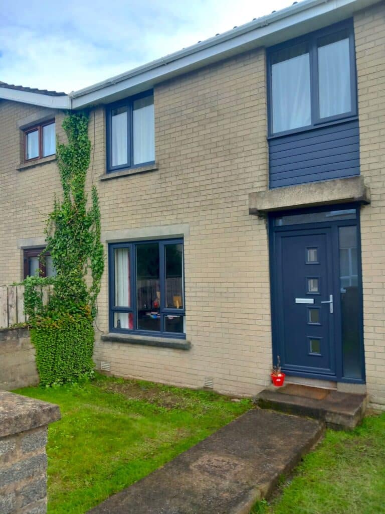Dark Grey uPVC Front Door With Matching Windows by Budget Designer HomeWorks