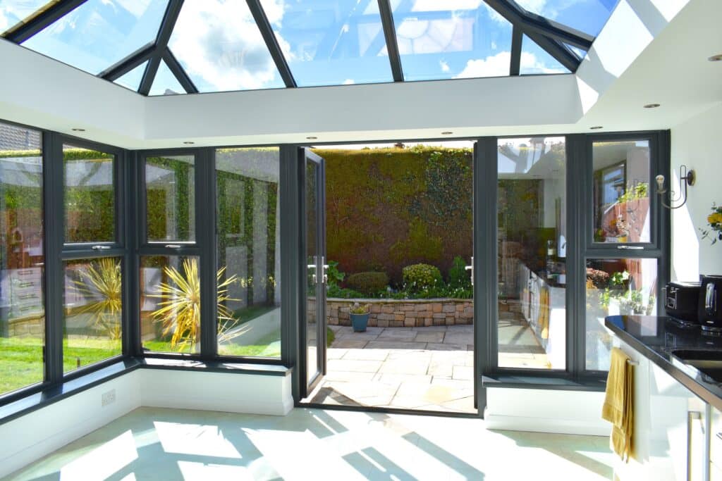 Orangery Extension With Rehau Windows & French Doors by Budget Designer HomeWorks