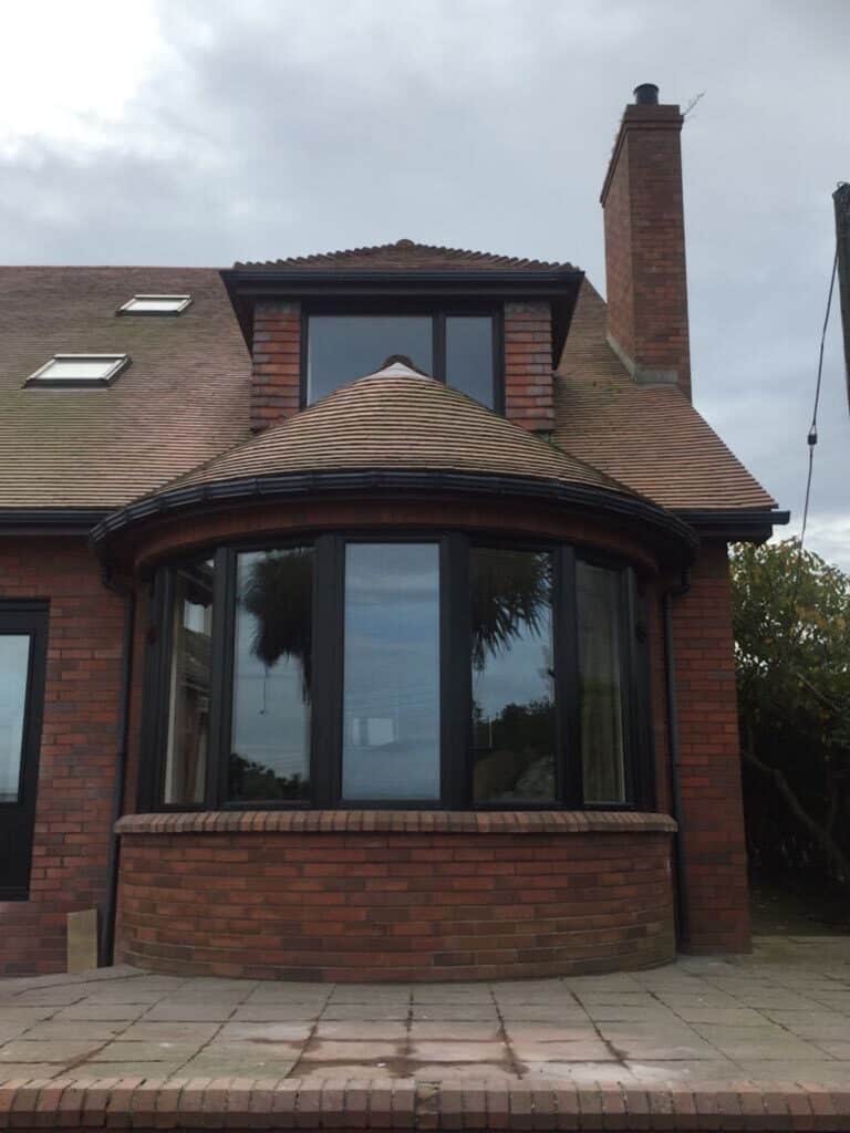 curved black windows in Donaghadee by Budget Designer HomeWorks